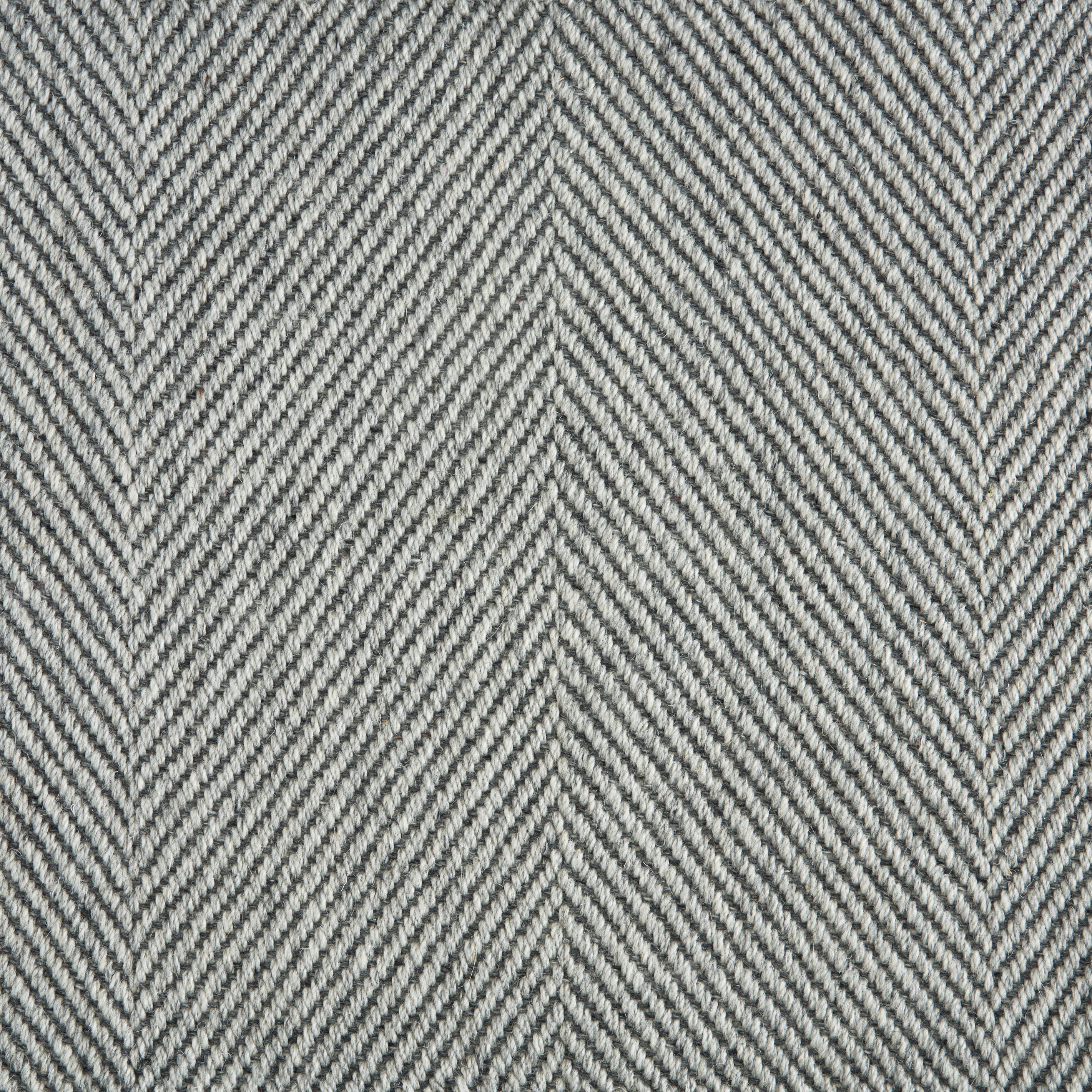Wool-blend broadloom carpet swatch in a flat herringbone weave in mottled gray and charcoal.