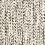 Outdoor broadloom carpet swatch in a chunky ribbed weave in mottled cream and charcoal.