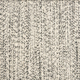 Outdoor broadloom carpet swatch in a chunky ribbed weave in mottled cream and charcoal.