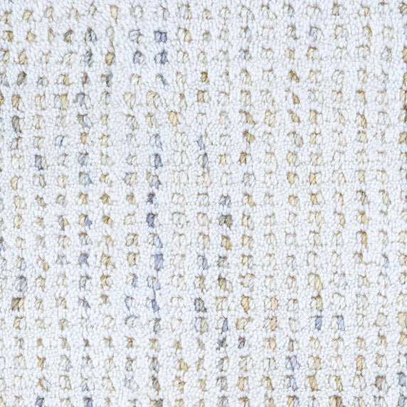 Wool broadloom carpet swatch in a high-pile loop weave in white and shades of cream and brown.