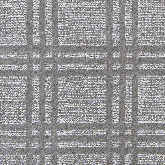 Nylon broadloom carpet swatch in a dimensional plaid weave in graphite.