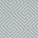 Wool broadloom carpet swatch in a high-pile interlocking geometric pattern in cream and light blue.