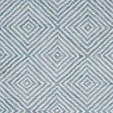 Wool broadloom carpet swatch in a dense repeating diamond print in light blue and white.