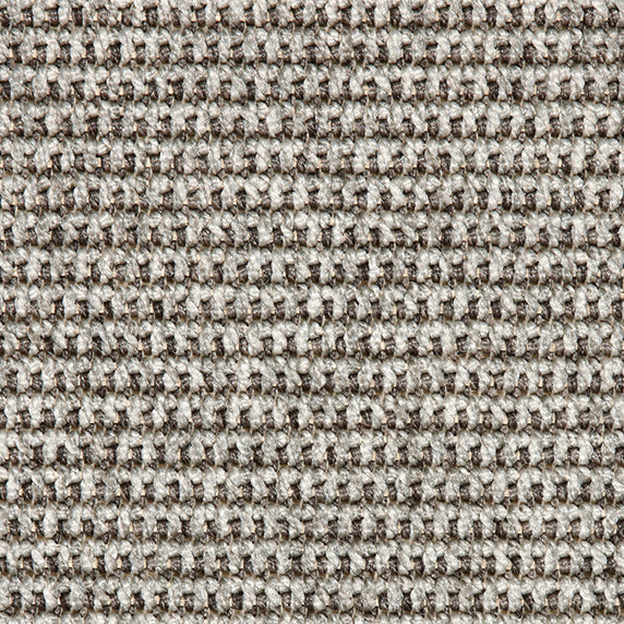 Outdoor broadloom carpet swatch in a textured linear weave in shades of gray and brown.