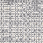 Wool broadloom carpet swatch in an abstract grid print in blue-gray and cream.