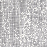 Wool broadloom carpet swatch in an irregular looped weave in gray with white accents.