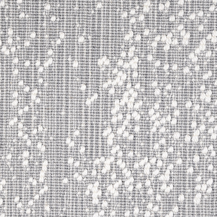 Wool broadloom carpet swatch in an irregular looped weave in gray with white accents.