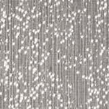 Wool broadloom carpet swatch in an irregular looped weave in charcoal with white accents.