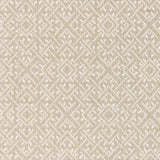 Wool-nylon broadloom carpet swatch in a geometric lattice print in cream and tan.