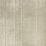 Nylon broadloom carpet swatch in a ribbed weave in cream.