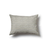 Rectangular throw pillow in a striped pattern of hand-drawn white and brown honeycomb shapes on a tan background.
