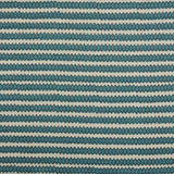 Swatch of fabric with rows of hand-drawn navy and turquoise honeycomb shapes on a cream background.