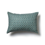 Rectangular throw pillow with a repeating Japanese-inspired scalloped pattern in shades of blue, and cream.