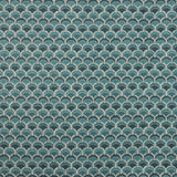 Swatch of fabric with a repeating Japanese-inspired scalloped pattern in shades of blue, navy and tan.