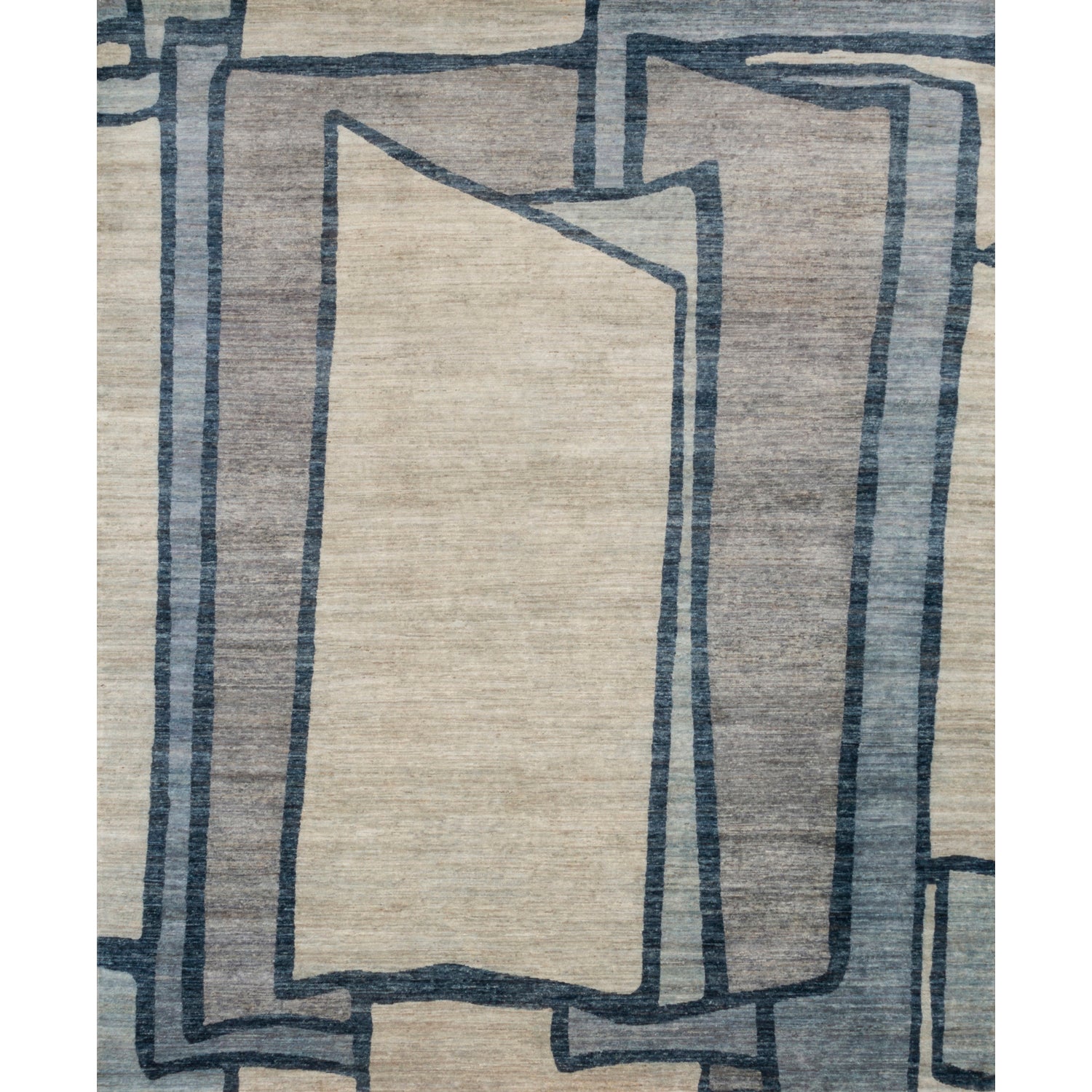 Rectangular rug in a large-scale abstract pattern of overlapping square shapes in shades of navy, tan and brown.