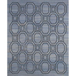 Rectangular rug with an interlocking octagon and square pattern in navy blue on a mottled blue background.