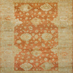 Large rectangular rug with a minimalist floral pattern in tan on a red field, with a tan border of linear florals in red.