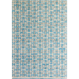Large rectangular rug with an interlocking linear "gate" pattern in shades of white and gray on a sky-blue field.