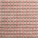 Woven rug swatch in a small-scale grid pattern featuring squares of white, pink, tan and brown.
