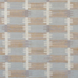 Woven rug swatch in a stripe motif broken by rows of rectangular shapes in white and gray on a blue and tan field.