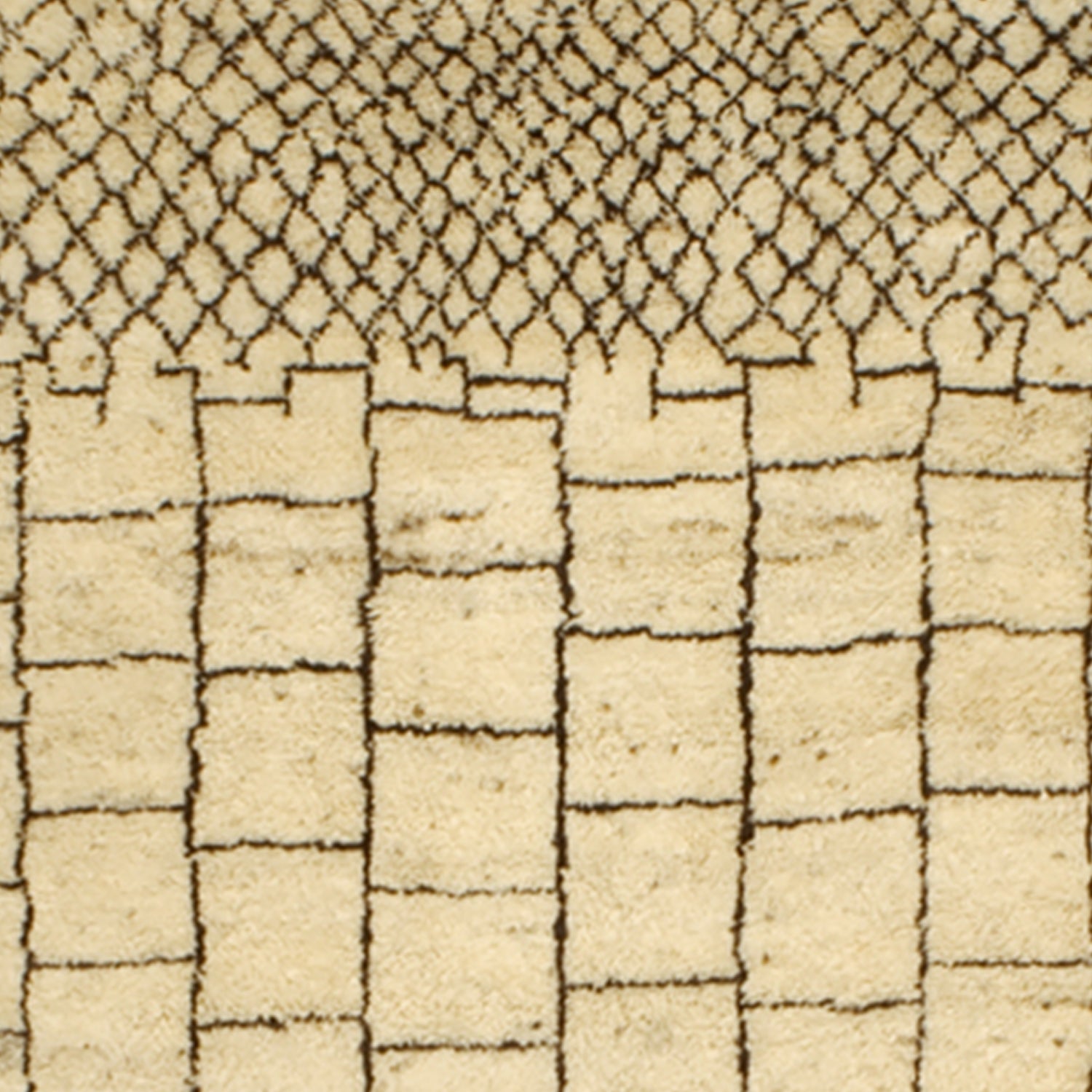 Woven high-pile rug swatch in an ombre pattern of repeating squares that turn into dense diamonds in black on a tan field.