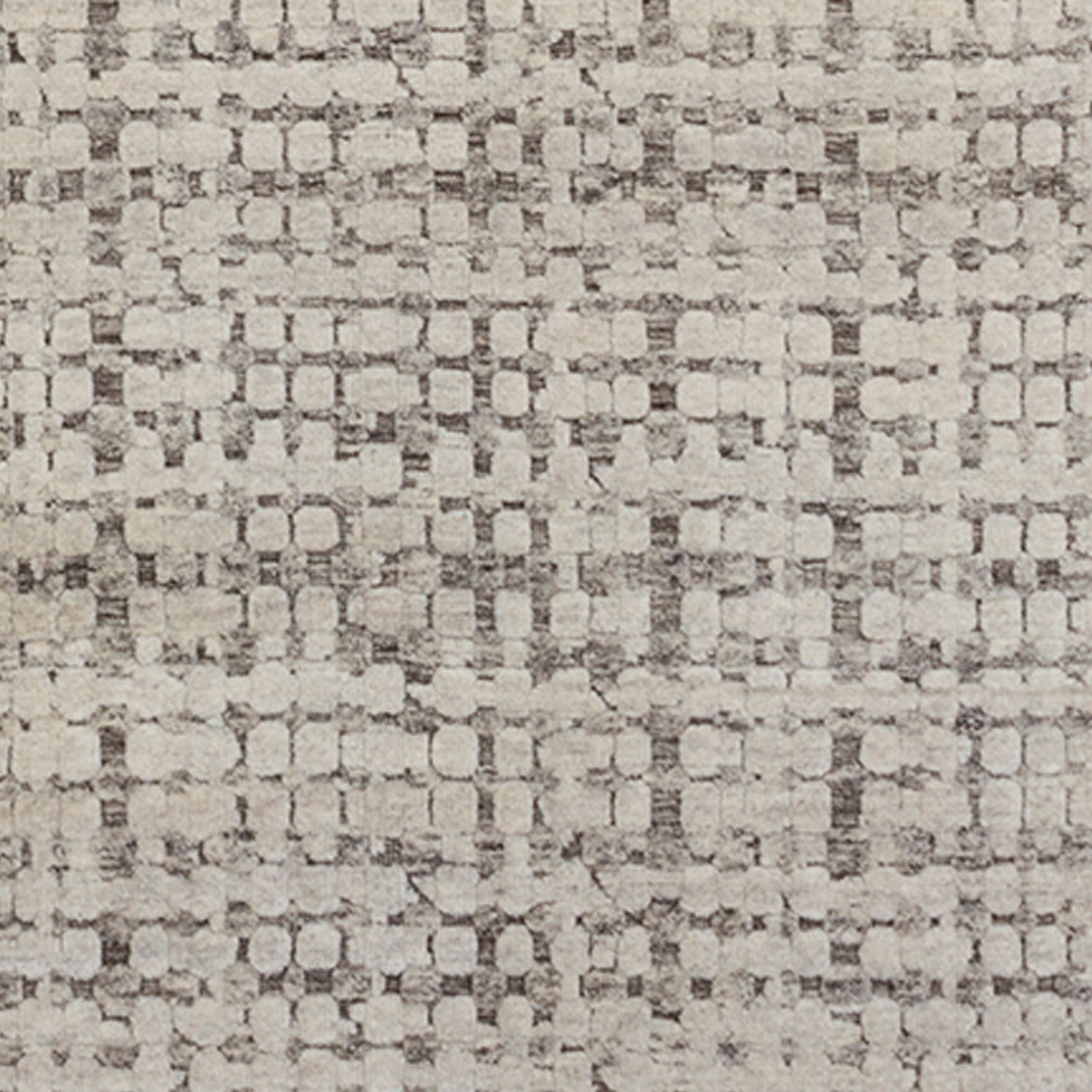 Woven rug swatch in a small-scale honeycomb pattern in dark gray on a gray field.
