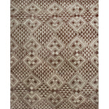 High-pile rectangular rug in a dense geometric pattern of diamonds in various sizes in shades of brown and cream.