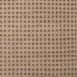 Woven rug swatch in a dense repeating floral honeycomb pattern in purple on a tan field.