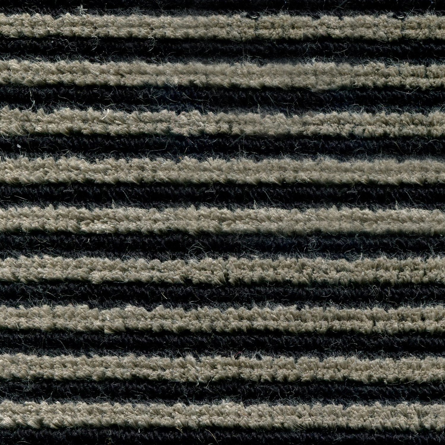 Wool-linen broadloom carpet swatch in a chunky striped weave in shades of gray and black.