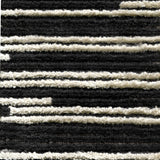 Wool-silk broadloom carpet swatch in a dimensional broken stripe pattern in black and white.