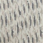 Wool-blend broadloom carpet swatch in a repeating abstract print in tan and charcoal on a cream field.