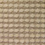 Wool-silk broadloom carpet swatch in a dimensional flat-and-tufted grid weave in beige.