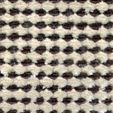 Wool-silk broadloom carpet swatch in a dimensional flat-and-tufted grid weave in cream and dark brown.