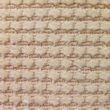 Wool-silk broadloom carpet swatch in a dimensional flat-and-tufted grid weave in cream.