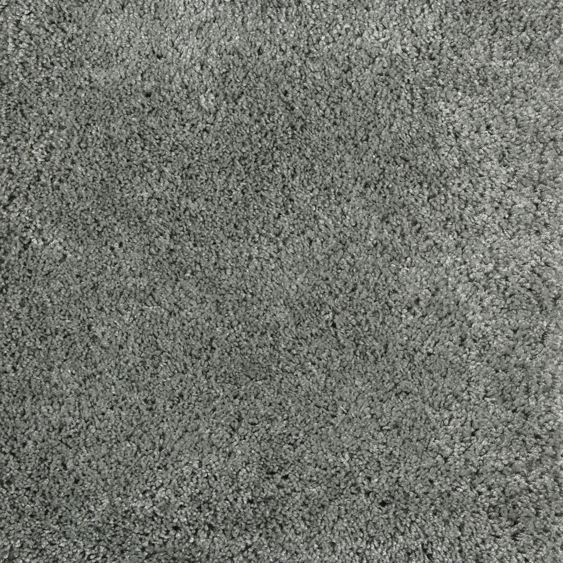 Synthetic broadloom carpet swatch in a cut pile texture in gray-green.