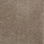 Synthetic broadloom carpet swatch in a cut pile texture in sable.