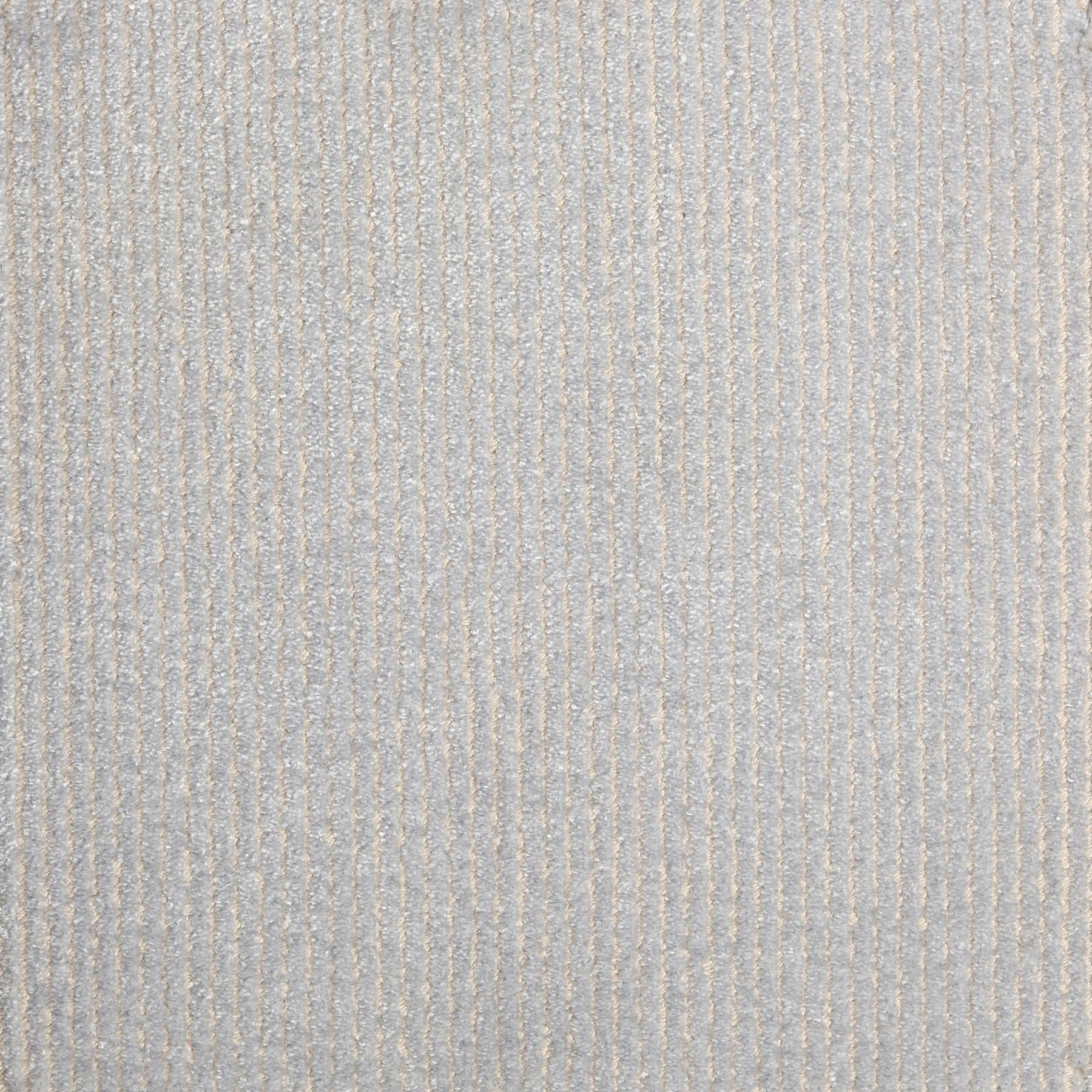 Synthetic-blend broadloom carpet swatch in a dimensional ribbed weave in dove gray.