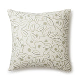 A square throw pillow in a large-scale minimal floral print in shades of tan and brown on a cream background.