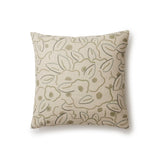 A square throw pillow in a large-scale minimal floral print in shades of tan and green on a cream background.