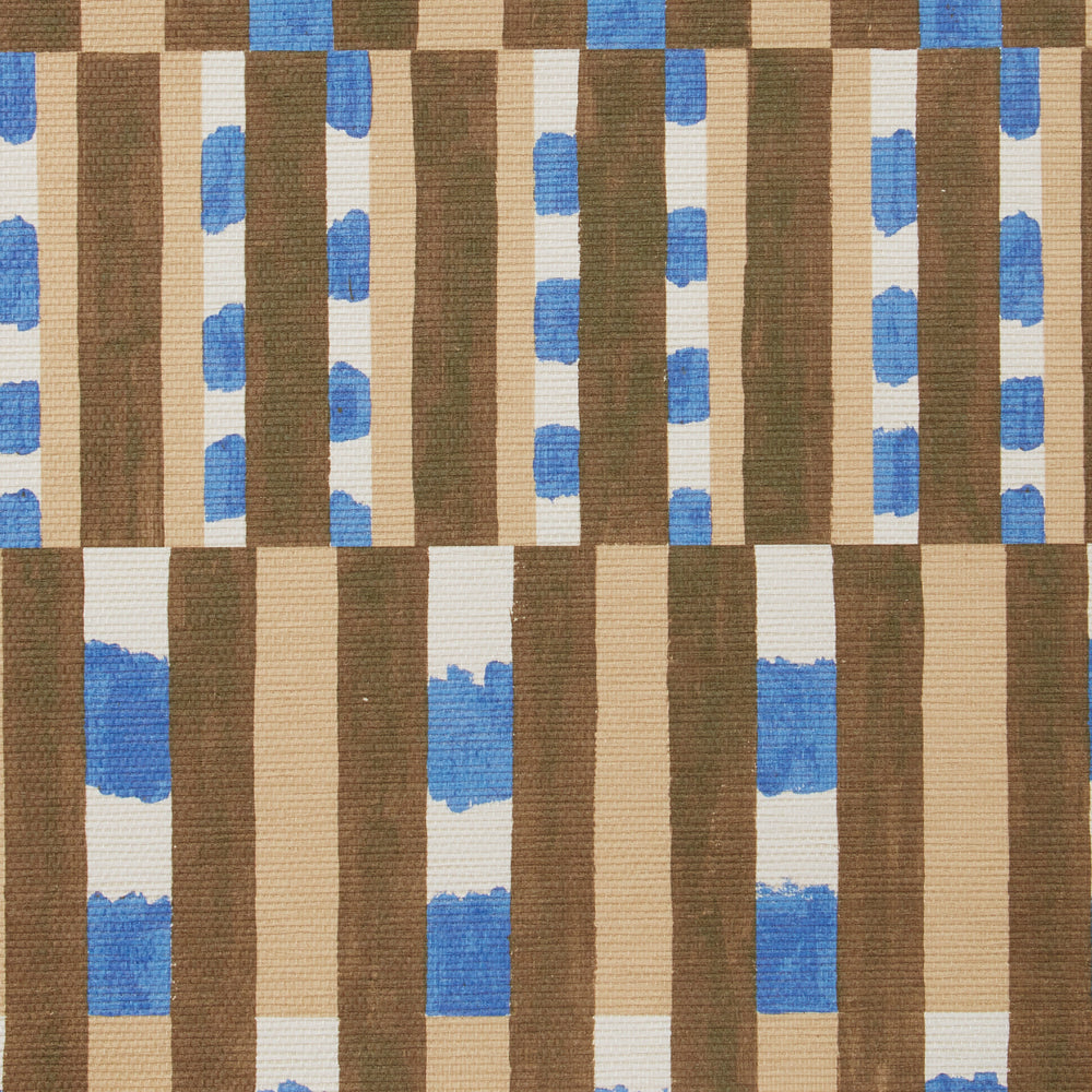 Detail of a textured wallpaper with a pattern of vertical stripes of light tan, dark olive green and dashes of cobalt blue and white.