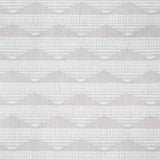 Swatch of linen fabric in a linear pattern with a sand dune-shaped triangle stripe motif in shades of cream and white.
